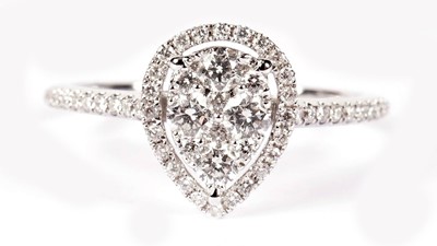 Lot 1273 - A pear-shaped diamond ring