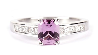 Lot 1286 - A pink sapphire and diamond ring