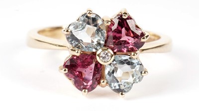 Lot 1288 - A tourmaline and aquamarine loveheart flowerhead dress ring