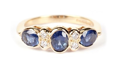 Lot 1300 - A sapphire and diamond ring