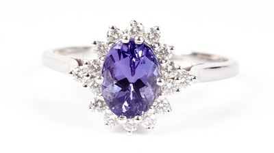 Lot 1301 - A tanzanite and diamond cluster ring