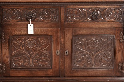 Lot 113 - Jaycee: an oak sideboard and matching extending dining table retailed by Chapmans of Newcastle.