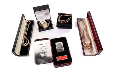 Lot 437 - A Smiths wristwatch; a Zippo lighter; and three necklaces