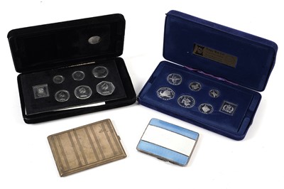 Lot 281 - Two Pobjoy Mint Ltd Isle of Man coin sets; and two cigarette cases