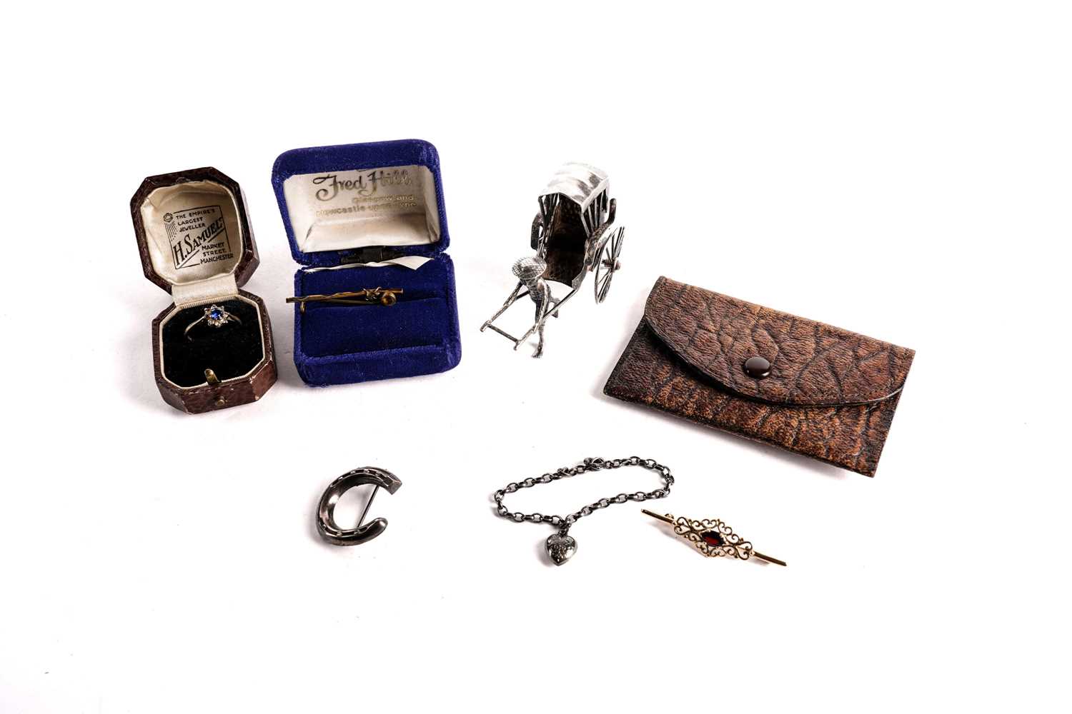 Lot 516 - A Chinese silver rickshaw and driver, and other items