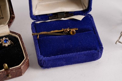 Lot 516 - A Chinese silver rickshaw and driver, and other items