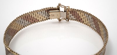 Lot 532 - A 9ct yellow, white and rose gold bracelet