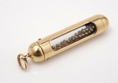 Lot 557 - An 18ct yellow gold mounted vial