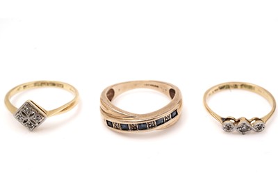 Lot 561 - Two diamond rings and a sapphire and diamond ring