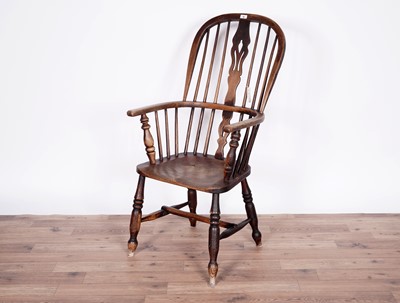 Lot 56 - A 19th Century beech and elm Windsor chair