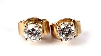 Lot 697 - A pair of diamond stud earrings