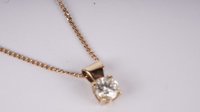 Lot 1084 - A single-stone diamond pendant