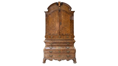 Lot 959 - A Dutch burr walnut bombe cabinet on chest, late 18th/early 19th Century