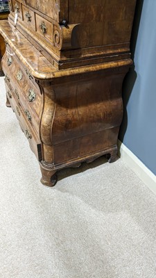 Lot 959 - A Dutch burr walnut bombe cabinet on chest, late 18th/early 19th Century