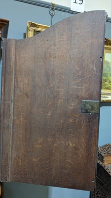 Lot 959 - A Dutch burr walnut bombe cabinet on chest, late 18th/early 19th Century