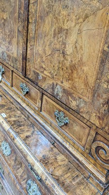 Lot 959 - A Dutch burr walnut bombe cabinet on chest, late 18th/early 19th Century