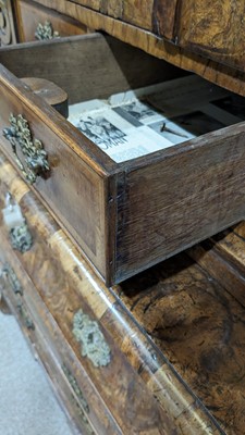 Lot 959 - A Dutch burr walnut bombe cabinet on chest, late 18th/early 19th Century