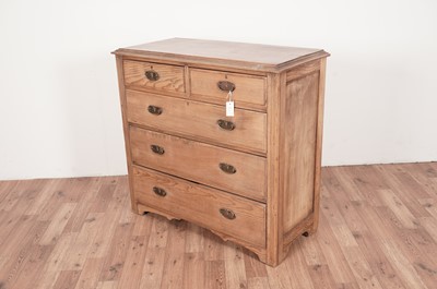 Lot 72 - An Edwardian stripped pine chest of drawers