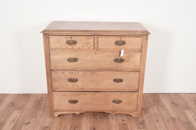 Lot 72 - An Edwardian stripped pine chest of drawers
