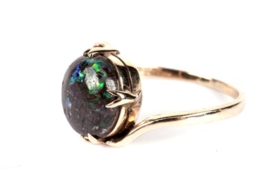 Lot 1091 - A black boulder opal ring