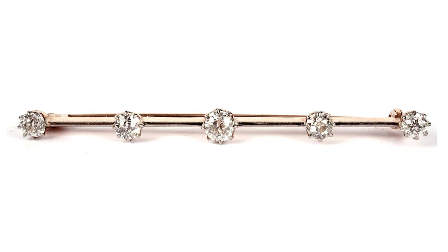 Lot 1092 - A late Victorian five stone diamond bar brooch