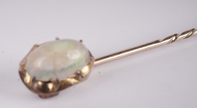 Lot 1093 - A water-opal tie pin
