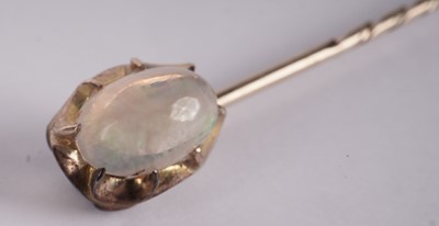 Lot 1093 - A water-opal tie pin