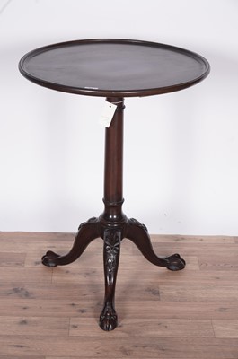 Lot 60 - A decorative and well carved mahogany tripod table, c1900