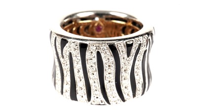 Lot 1119 - Roberto Coin: an 18ct white gold, black enamel and diamond 'Zebra' ring
