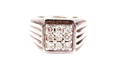 Lot 715 - A nine-stone diamond ring