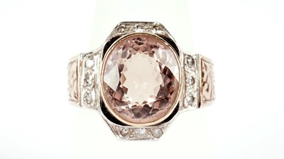 Lot 710 - A pink-topaz and diamond dress ring