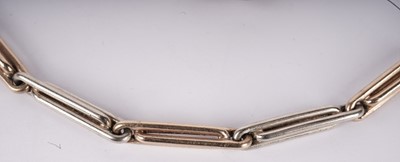 Lot 1126 - Two fancy 9ct gold fetter-link watch chains