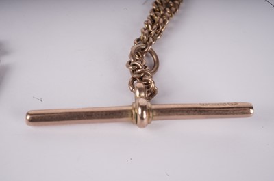 Lot 1129 - Three 9ct rose gold curb-link watch chains