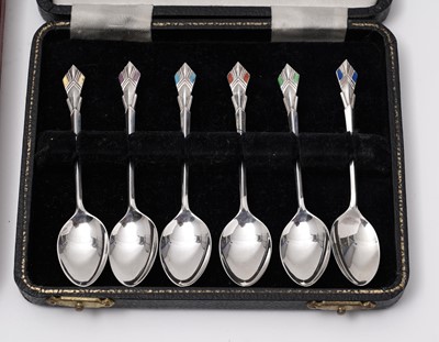 Lot 661 - A set of six coffee spoons; and a set of six pairs of fruit knives and forks