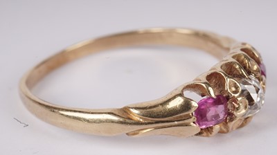 Lot 1137 - A ruby and diamond dress ring