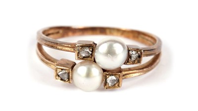 Lot 696 - A pearl and diamond bow-tie dress ring