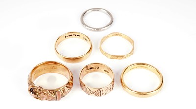 Lot 1145 - A selection of wedding bands and other rings
