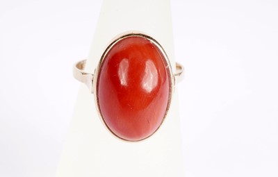 Lot 367 - A coral and yellow gold dress ring