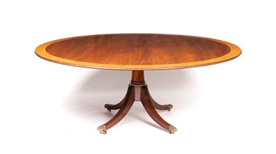 Lot 958 - A William Tillman style mahogany and satinwood banded dining table in the Regency taste