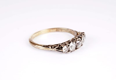 Lot 1147 - A five stone diamond ring