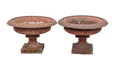 Lot 923 - Two classical style cast iron garden urns