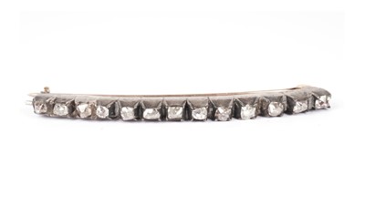 Lot 1149 - A diamond bar brooch