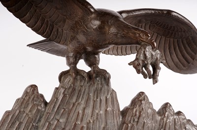 Lot 880 - A large bronze figure of an eagle with prey, by Lucien Gibert