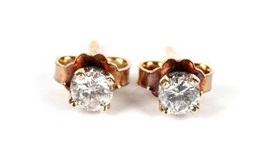Lot 350 - A pair of diamond stud earrings
