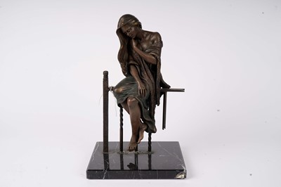 Lot 265 - A bronzed cast resin sculpture