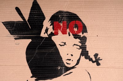 Lot 701 - BANKSY - "Bomb Hugger" / NO Anti-Iraq War Protest March Placard | spray paint on cardboard