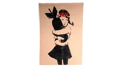 Lot 701 - BANKSY - "Bomb Hugger" / NO Anti-Iraq War Protest March Placard | spray paint on cardboard