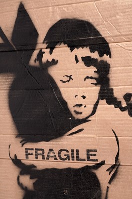 Lot 702 - BANKSY - "Bomb Hugger" / FRAGILE Anti-Iraq War Protest March Placard | spray paint on cardboard