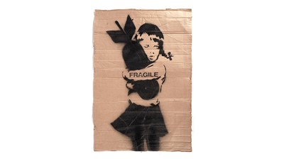 Lot 702 - BANKSY - "Bomb Hugger" / FRAGILE Anti-Iraq War Protest March Placard | spray paint on cardboard