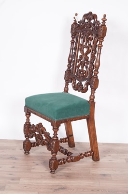 Lot 67 - A decorative late Victorian carved oak hall chair